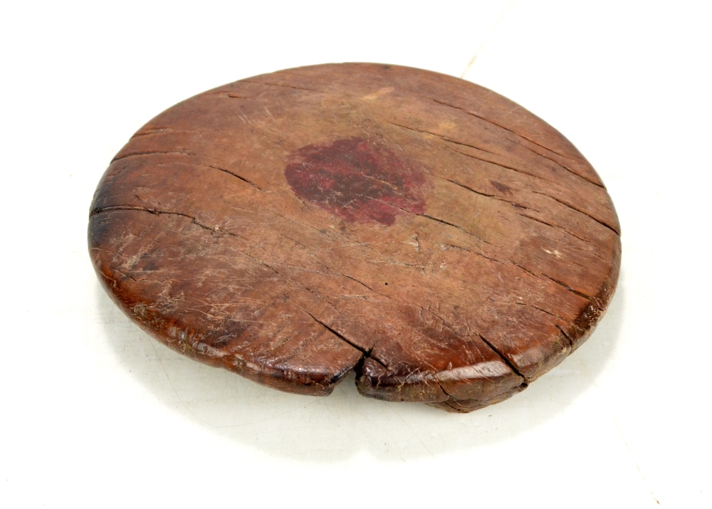 An 18th century yew wood circular pan/cheese stand, raised on four simple turned supports,