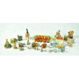 A group of Wade Whimsies including polar bears, a hippopotamus and a rhinoceros,