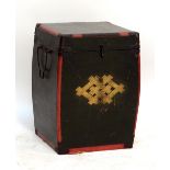 An Oriental twin handled leather bound box or case with gilt detail to three sides,