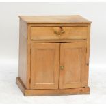 A small pine side cabinet with single drawer above two cupboard base, width 67cm.