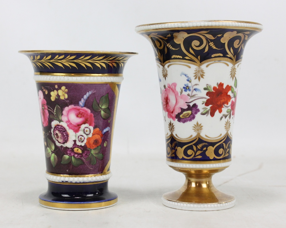 Two Coalport floral painted gilt heightened spill vases, height 16.25cm and 13.8cm (2).