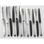 WILLIAM BUSH & SONS (probably); a set of six Elizabeth II hallmarked silver handled dinner knives,