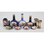 Eight floral painted Coalport vases including squat form examples,