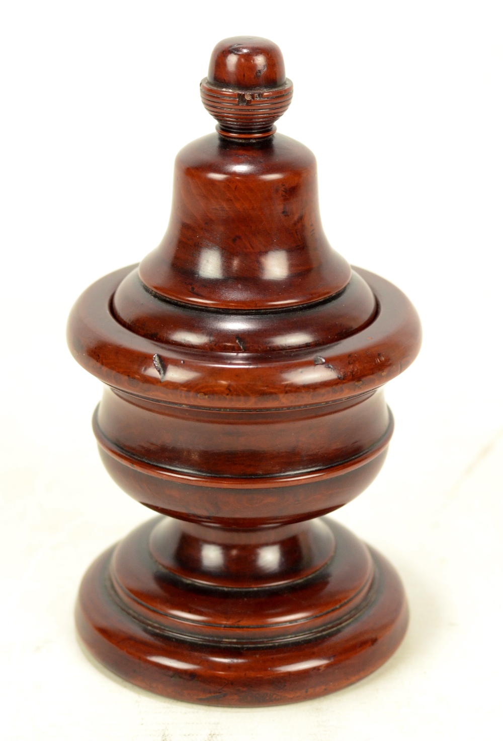 A good 19th century yew wood lidded pedestal bowl,