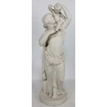 A late 19th century Parian Ware figure of a scantily clad young woman with child upon her shoulder,