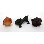 Two resin netsukes modelled as a toad and Dog of Fo respectively,