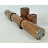 A brass and leather clad military issued two draw telescope, inscribed 'W Watson & Sons,