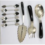 A set of six Malaysian silver coffee spoons with foliate finials,