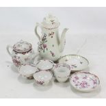 A small group of 18th century New Hall porcelain comprising a set of three floral decorated teacups