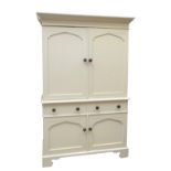 A cream painted pine side cabinet,