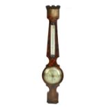 A late 19th/early 20th century mahogany cased wheel barometer and thermometer,