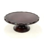 A late Victorian/Edwardian mahogany Lazy Susan, with spinning shaped circular top,