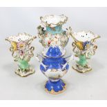 A pair of Coalport floral painted and floral encrusted elaborate gilt heightened vases, height 23cm,