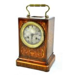An Edwardian rosewood and inlaid mantel clock on the form of an oversized carriage clock,