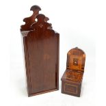 A late George III mahogany candle box with shaped back plate and similarly decorated front slide,