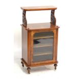 A Victorian figured walnut and marquetry inlaid music cabinet with raised upper shelf and glazed
