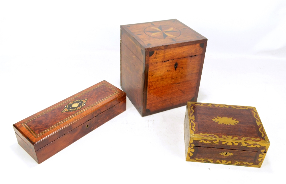 An early 19th century mahogany and inlaid rectangular decanter box (lacking interior), height 24.