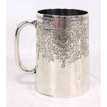 WAKELY & WHEELER; a Victorian hallmarked silver mug with engraved floral and foliate decoration,