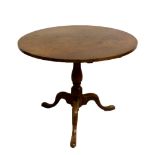 A George III mahogany tilt top tripod occasional table.