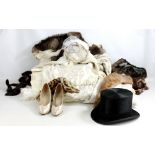 A small group of textiles including vintage wedding dress, veil and pair of high heeled shoes,