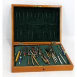 A collection of propelling pencils including British General Insurance examples, novelty pencil
