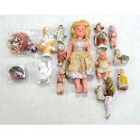 A Roddy fairy doll, three ceramic half dolls and further small dolls and figures.