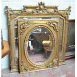 A large gilt mirror with moulded detail, approx 139 x 128cm, and a further smaller mirror (2).