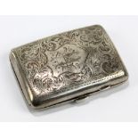 JOSEPH GLOSTER LTD; a George V hallmarked silver cigarette case of curved rectangular form, with