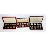 A 1937 cased specimen coin set, a 1953 coronation cased coin set and a 1950 cased coin set (3).