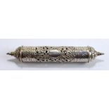 A 20th century white metal scroll holder with pierced and embossed foliate scroll motifs and