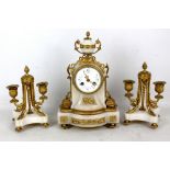 A late 19th century French alabaster three piece clock garniture with gilt metal mounts, the