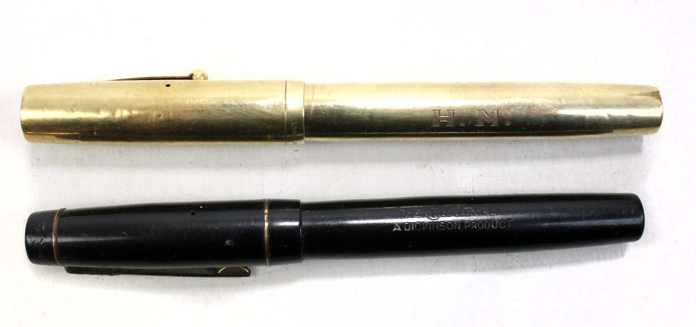 WATERMAN'S; a 14ct yellow gold fountain pen, the barrel engraved with the initials 'H.M.', and a