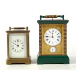 A circa 1900 brass repeater carriage clock, the rectangular foliate scroll engraved face with