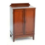 A mahogany two door side cabinet, width 58cm.