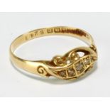 An early 20th century 18ct yellow gold and diamond dress ring, set with five melee stones within