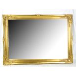 A modern gilt framed rectangular mirror with bevelled plate, 75 x 105cm.