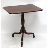 A 19th century mahogany rectangular tilt top tripod occasional table, width 70cm.