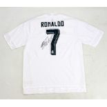 CRISTIANO RONALDO; a signed replica Real Madrid football shirt.