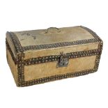 A late 18th/early 19th century domed pony skin covered and brass stud decorated lidded casket with