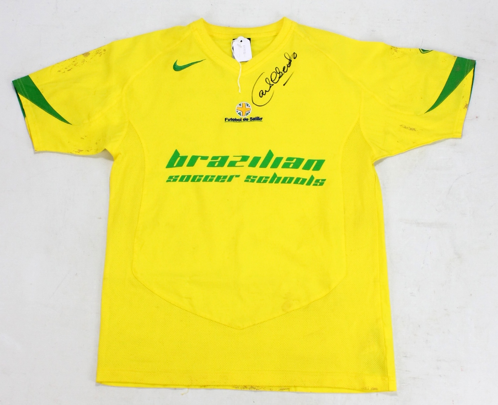 CARLOS ALBERTO; a signed replica Brazilian Soccer School T-shirt.