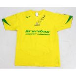 CARLOS ALBERTO; a signed replica Brazilian Soccer School T-shirt.