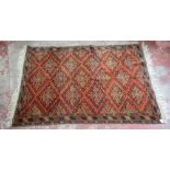 A red ground Tekke carpet, 217 x 148cm.