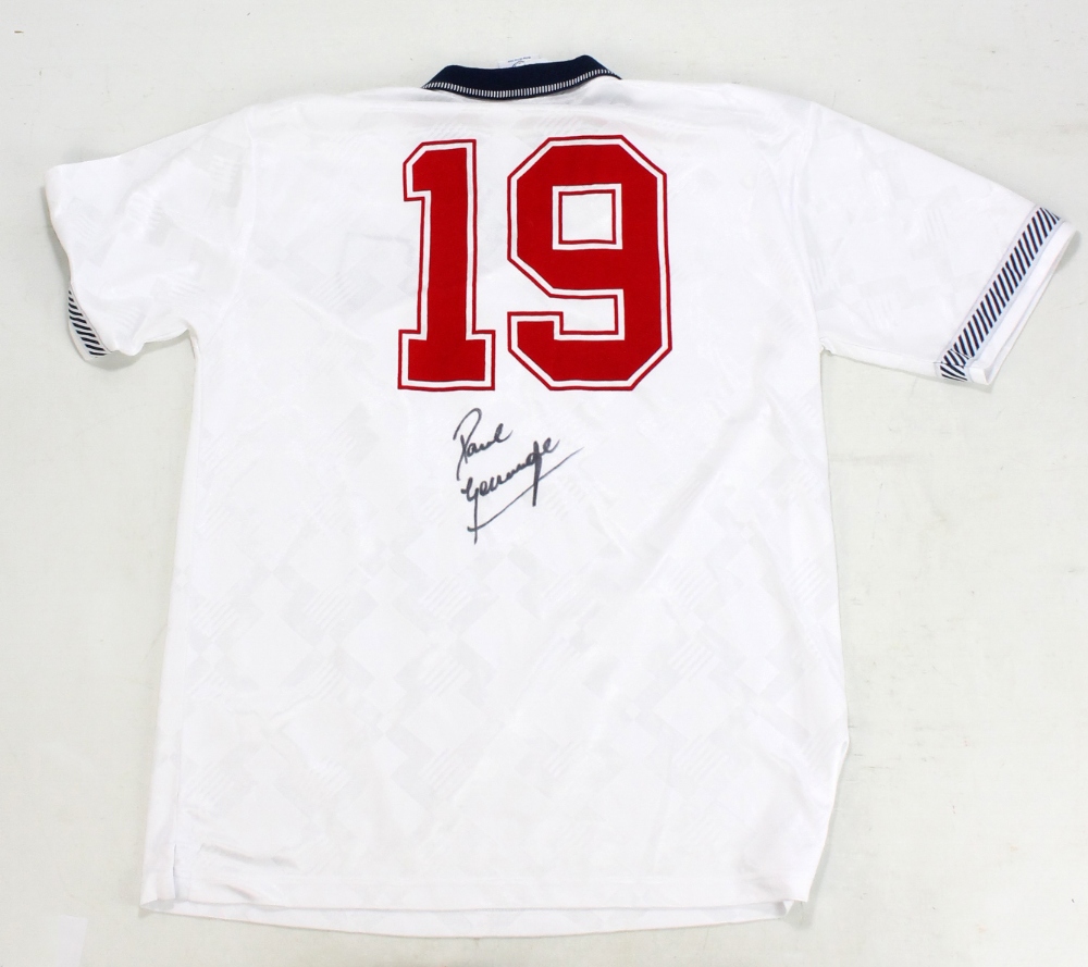 PAUL 'GAZZA' GASCOIGNE; a signed replica 1990 England football shirt.