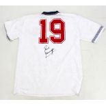 PAUL 'GAZZA' GASCOIGNE; a signed replica 1990 England football shirt.