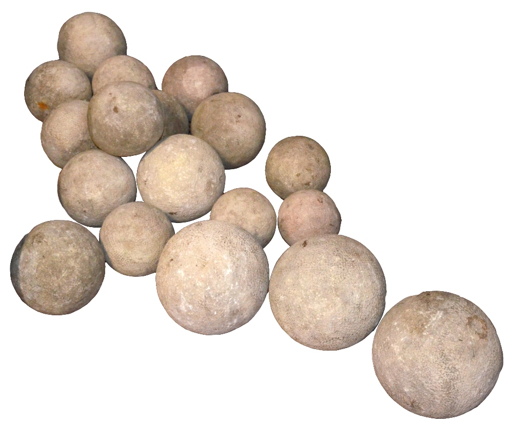 Eighteen carved English stone balls of varying sizes, diameter of largest approx 23cm. Provenance: