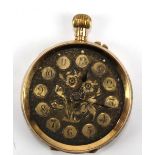 A late 19th century 15ct yellow gold crown wind open faced fob watch, the floral engraved dial set