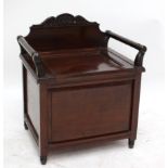 A late Victorian simulated mahogany commode raised on turned peg supports, width 55cm.