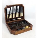 MAPPIN & WEBB; an oak cased canteen of plated cutlery.