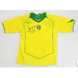 PELÉ; a signed replica 2005 Brazil shirt.