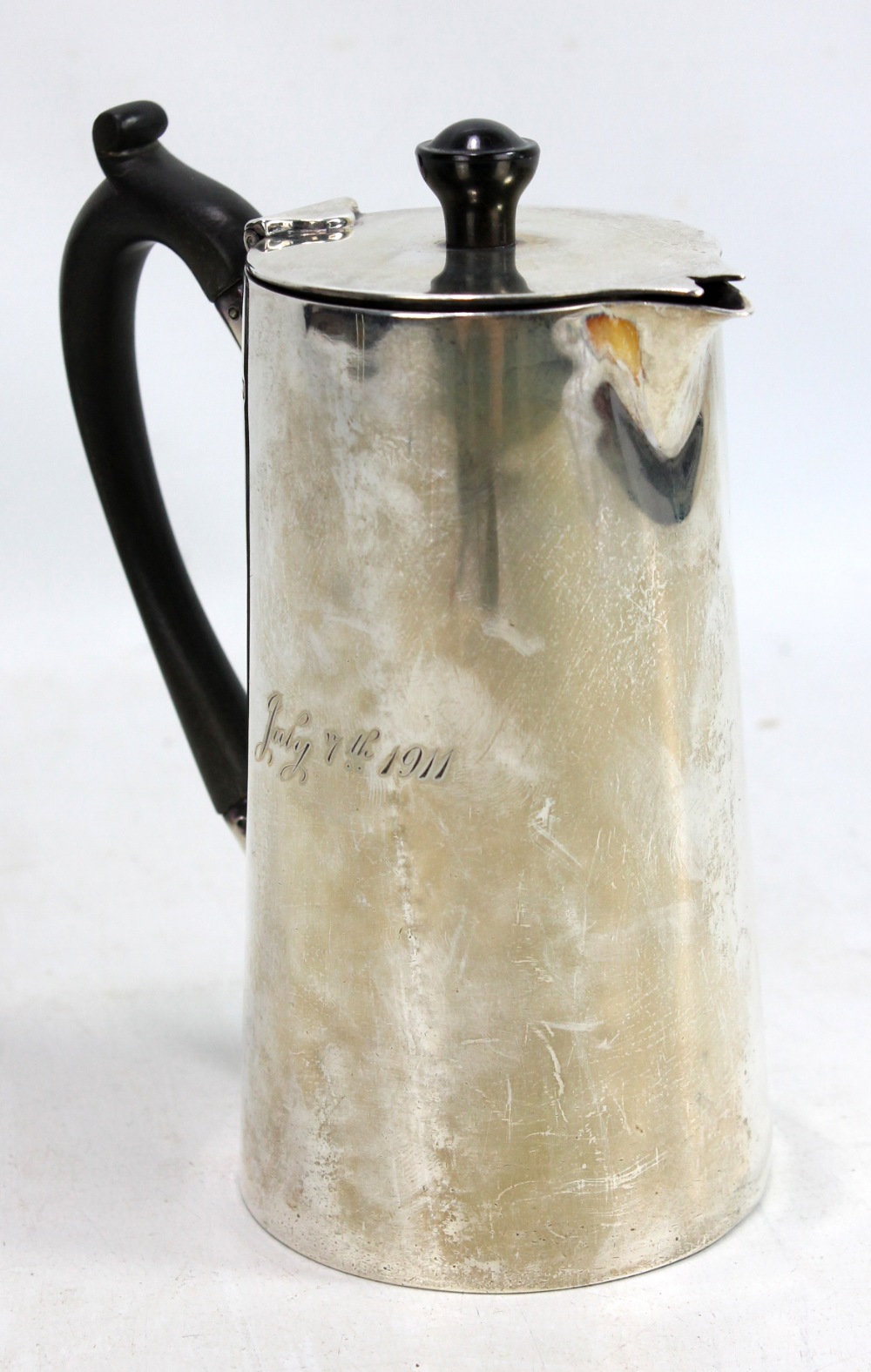 ATKIN BROS; an Edward VII hallmarked silver hot water jug of plain tapering form with inscription '